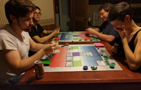 kaiju cardgame being played 4 players